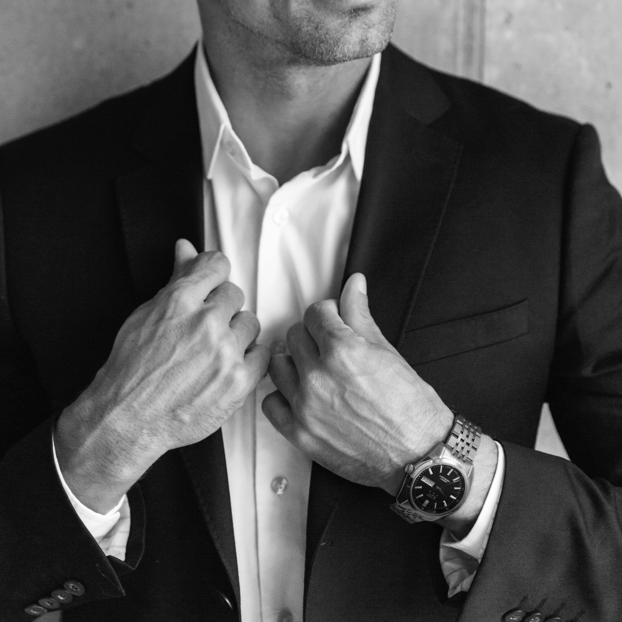 Close up portrait of a confident man dressed in suit
